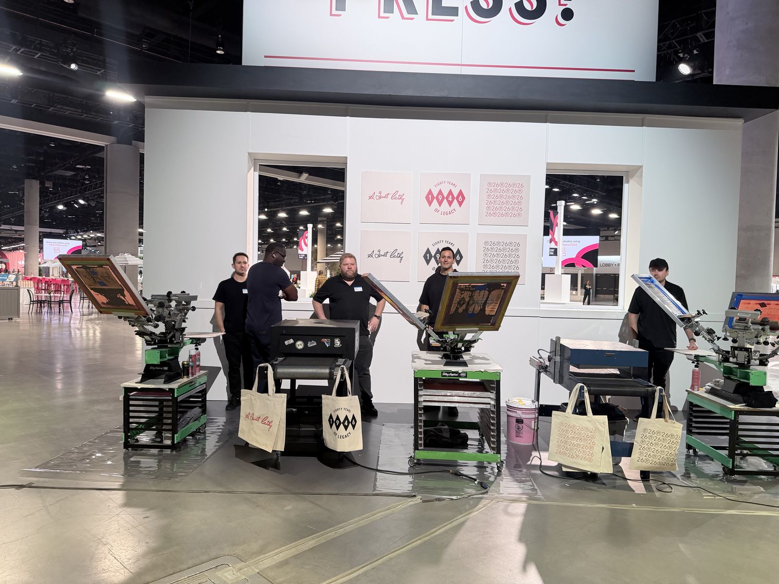 Merch Troop live screen-printing station running at a Salt Lake City event